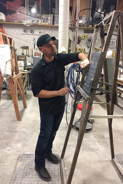 Sebastian Martorana '03 demonstrates carving